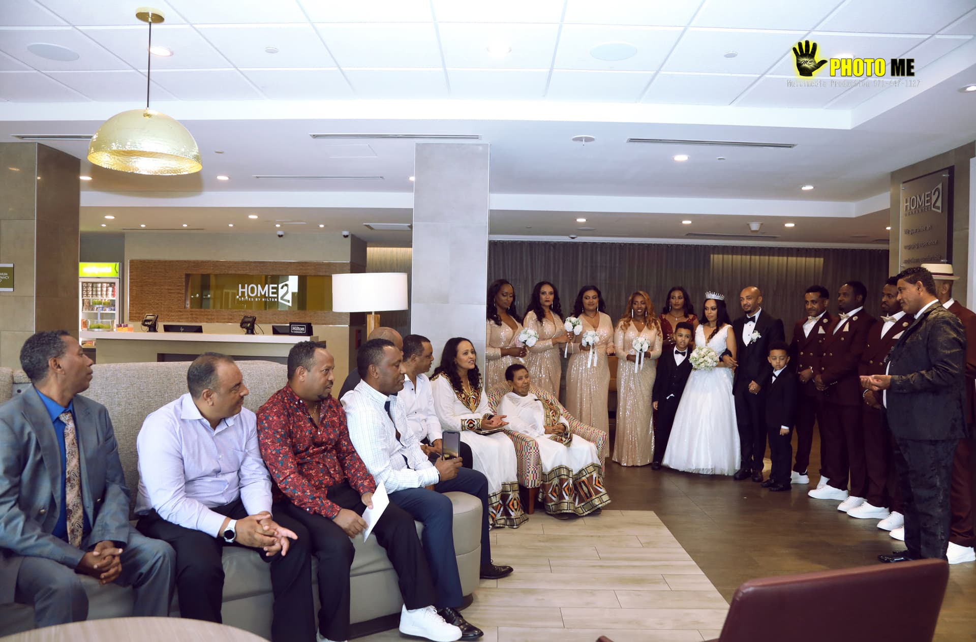 Wedding party group photo at golden hour